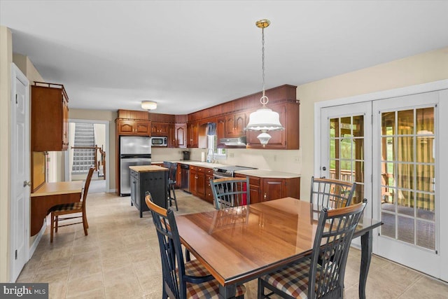3161 Grande Oak Pl, Lancaster, PA 17601 - dining space with baseboards and plenty of natural light