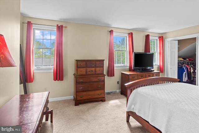 3161 Grande Oak Pl, Lancaster, PA 17601 - bedroom with multiple windows, light carpet, baseboards, and a walk in closet