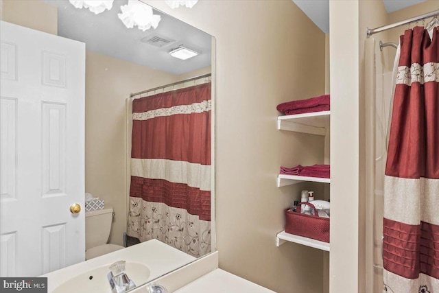 3161 Grande Oak Pl, Lancaster, PA 17601 - bathroom with toilet, visible vents, a shower with curtain, and a sink