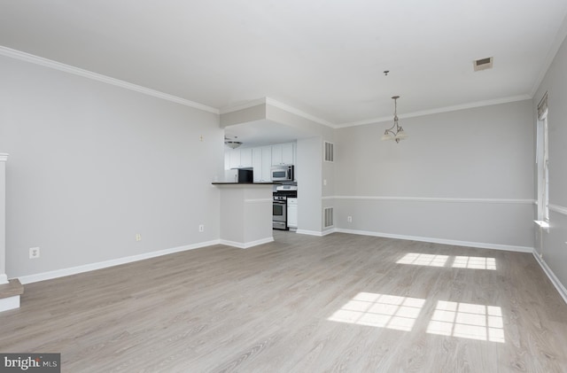 unfurnished living room featuring baseboards, visible vents, and light wood-type flooring