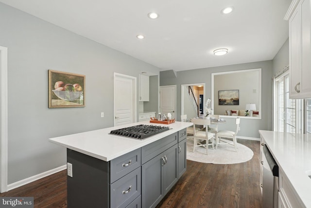51 Knickerbocker Ln, Malvern, PA 19355 - kitchen with gray cabinetry, dark wood-style floors, light countertops, stainless steel appliances, and baseboards
