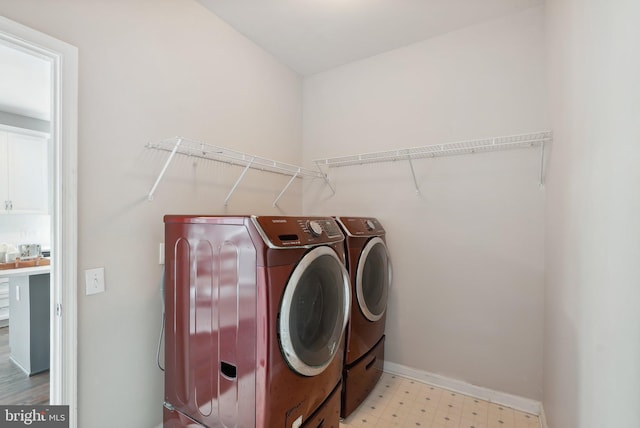 51 Knickerbocker Ln, Malvern, PA 19355 - laundry area featuring washing machine and dryer, light floors, and baseboards