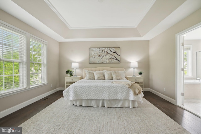 51 Knickerbocker Ln, Malvern, PA 19355 - bedroom with a tray ceiling, dark wood-style flooring, baseboards, and ensuite bathroom