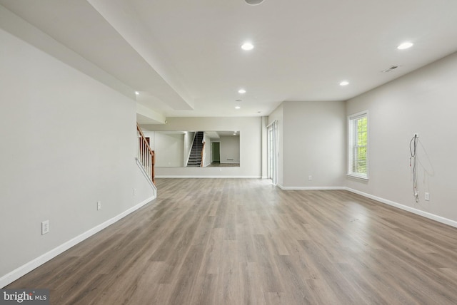 51 Knickerbocker Ln, Malvern, PA 19355 - unfurnished living room with baseboards, stairs, recessed lighting, and wood finished floors
