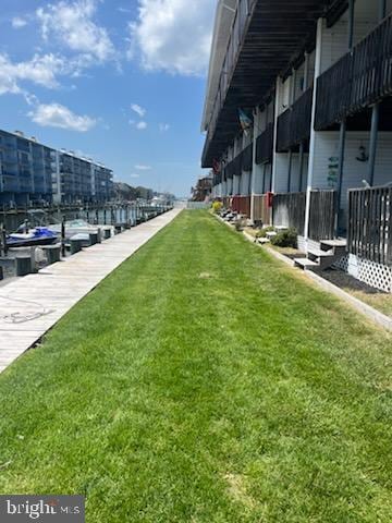 surrounding community with a lawn