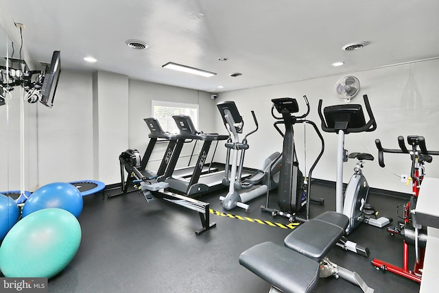gym with recessed lighting and visible vents