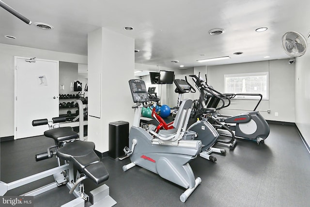 workout area featuring visible vents and baseboards