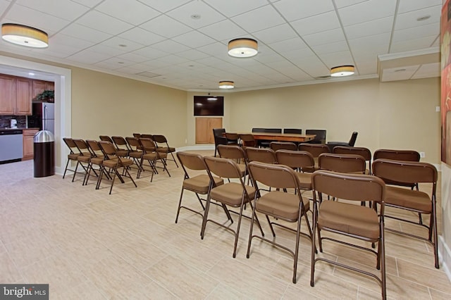 interior space with ornamental molding and a bar