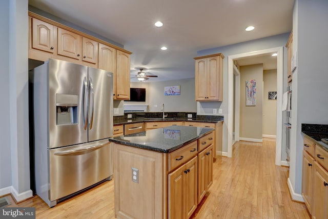 9124 Back Drop Dr, Perry Hall, MD 21128 - kitchen with appliances with stainless steel finishes, light brown cabinetry, a sink, dark stone countertops, and recessed lighting