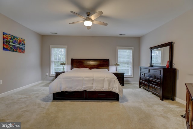 9124 Back Drop Dr, Perry Hall, MD 21128 - bedroom with light colored carpet, baseboards, and a ceiling fan