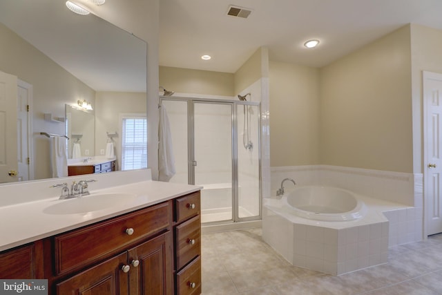 9124 Back Drop Dr, Perry Hall, MD 21128 - full bathroom featuring vanity, a stall shower, a bath, and tile patterned flooring