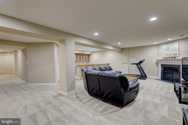 9124 Back Drop Dr, Perry Hall, MD 21128 - carpeted living room with recessed lighting, bar, a fireplace with flush hearth, and baseboards