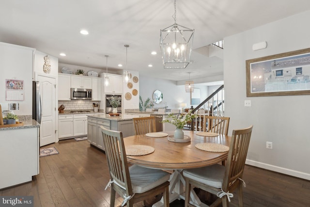29 Enclave Ct, Annapolis, MD 21403 - dining room with dark wood finished floors, stairway, recessed lighting, a chandelier, and baseboards