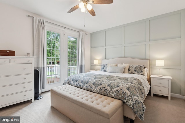 29 Enclave Ct, Annapolis, MD 21403 - carpeted bedroom with a decorative wall, access to outside, and a ceiling fan