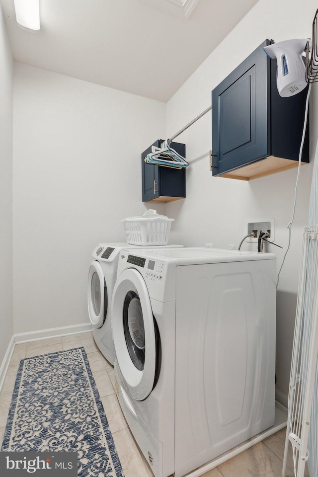 29 Enclave Ct, Annapolis, MD 21403 - clothes washing area featuring cabinet space, independent washer and dryer, baseboards, and light tile patterned floors