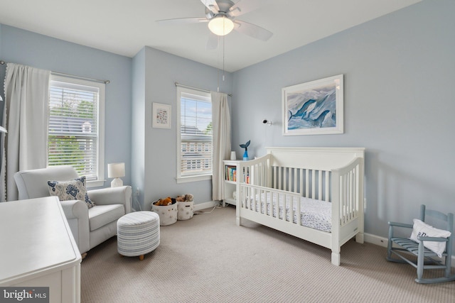 29 Enclave Ct, Annapolis, MD 21403 - bedroom with carpet, multiple windows, a nursery area, and baseboards