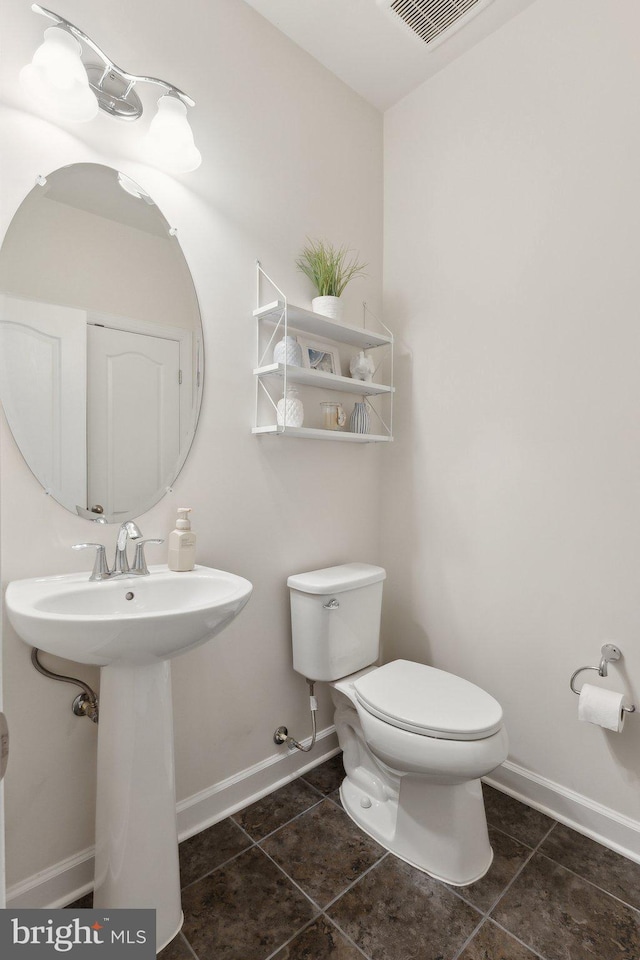 29 Enclave Ct, Annapolis, MD 21403 - half bath with toilet, baseboards, and tile patterned floors