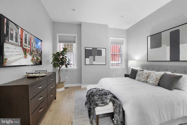 903 R St NW Unit 1, Washington, DC 20001 - bedroom featuring baseboards and light wood-type flooring