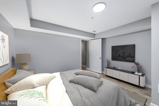 903 R St NW Unit 1, Washington, DC 20001 - bedroom featuring baseboards and wood finished floors