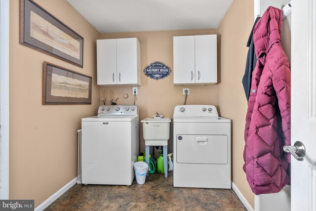 22 Cochise Cir, Medford Lakes, NJ 08055 - washroom featuring washing machine and clothes dryer, cabinet space, a sink, baseboards, and stone finish flooring