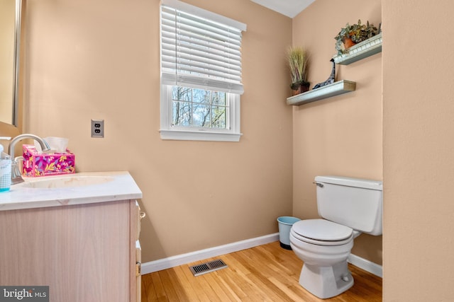 22 Cochise Cir, Medford Lakes, NJ 08055 - bathroom with toilet, baseboards, visible vents, and wood finished floors