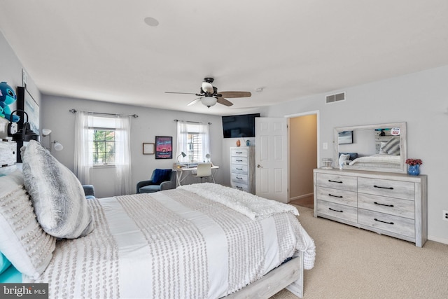 22 Cochise Cir, Medford Lakes, NJ 08055 - bedroom featuring baseboards, light carpet, a ceiling fan, and visible vents