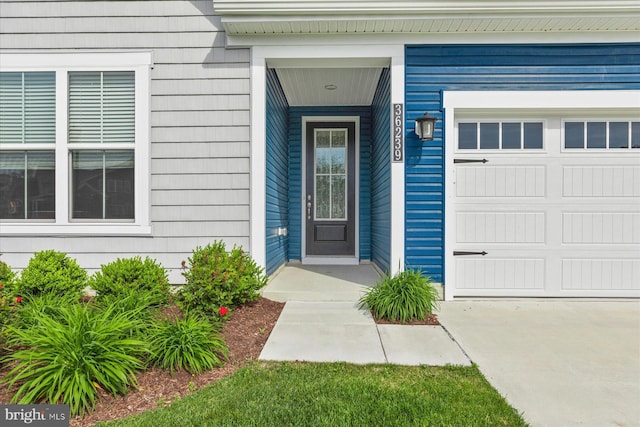 property entrance with a garage