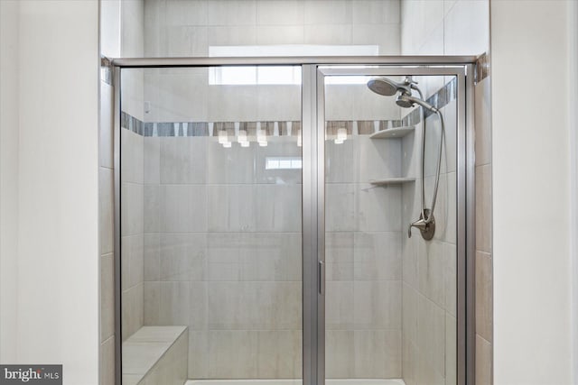 bathroom with a stall shower
