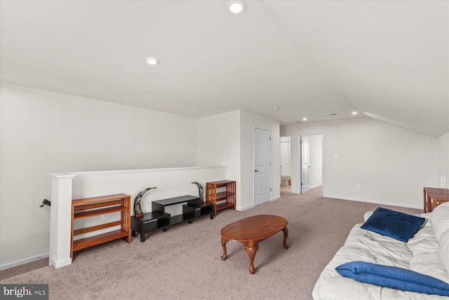 interior space with lofted ceiling, baseboards, and recessed lighting