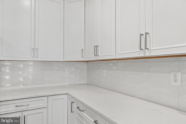 interior space with decorative backsplash