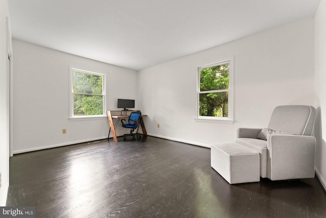 10133 Pine St, Oakton, VA 22124 - living area with wood finished floors, healthy amount of natural light, baseboards, and an office area