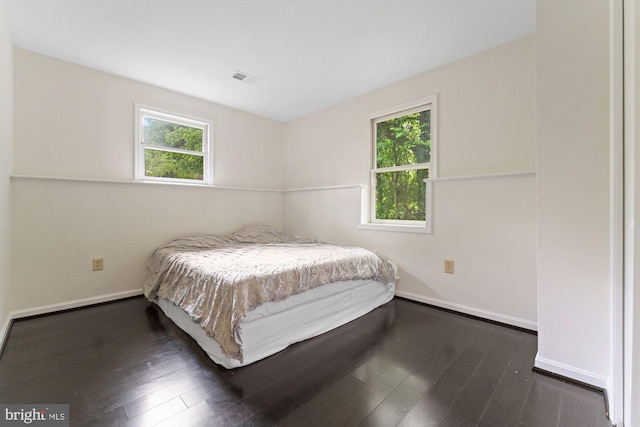 10133 Pine St, Oakton, VA 22124 - bedroom featuring baseboards and dark wood-style flooring