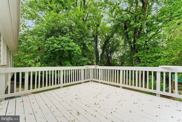 10133 Pine St, Oakton, VA 22124 - wooden deck featuring view of scattered trees
