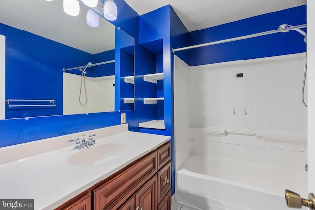 full bathroom featuring shower / tub combination and vanity
