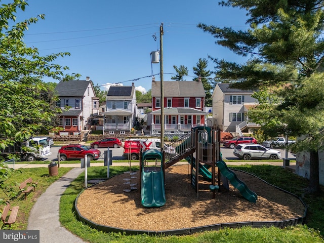 community play area with a residential view