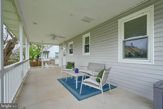 view of patio / terrace featuring ceiling fan