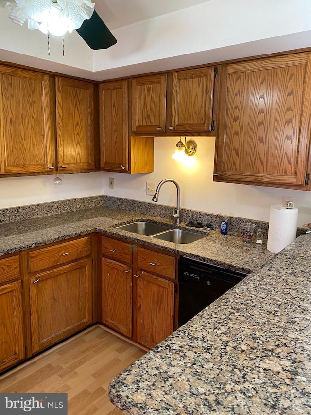 12896 Schalk Ct, Woodbridge, VA 22192 - kitchen with a sink, dishwasher, light wood finished floors, and brown cabinetry