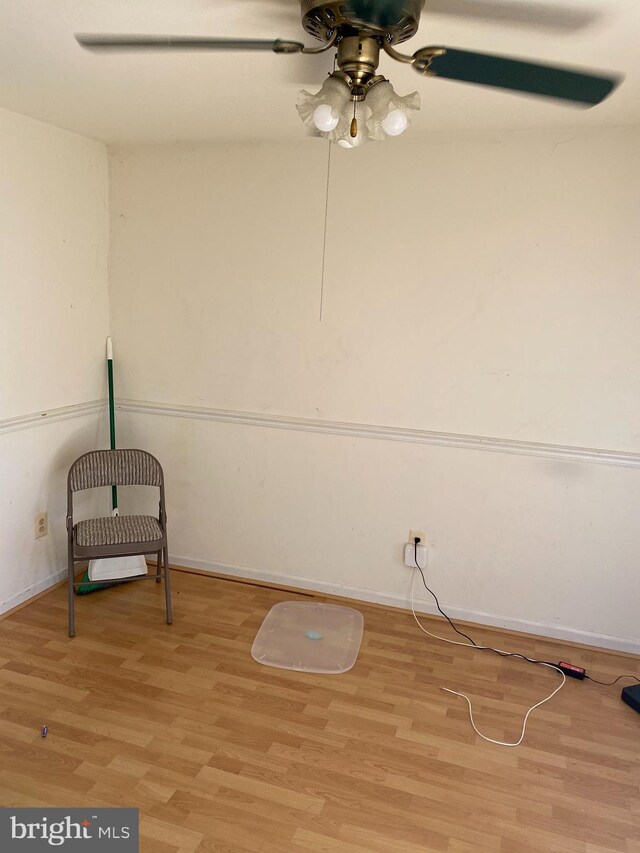 12896 Schalk Ct, Woodbridge, VA 22192 - spare room with light wood-type flooring, a ceiling fan, and baseboards
