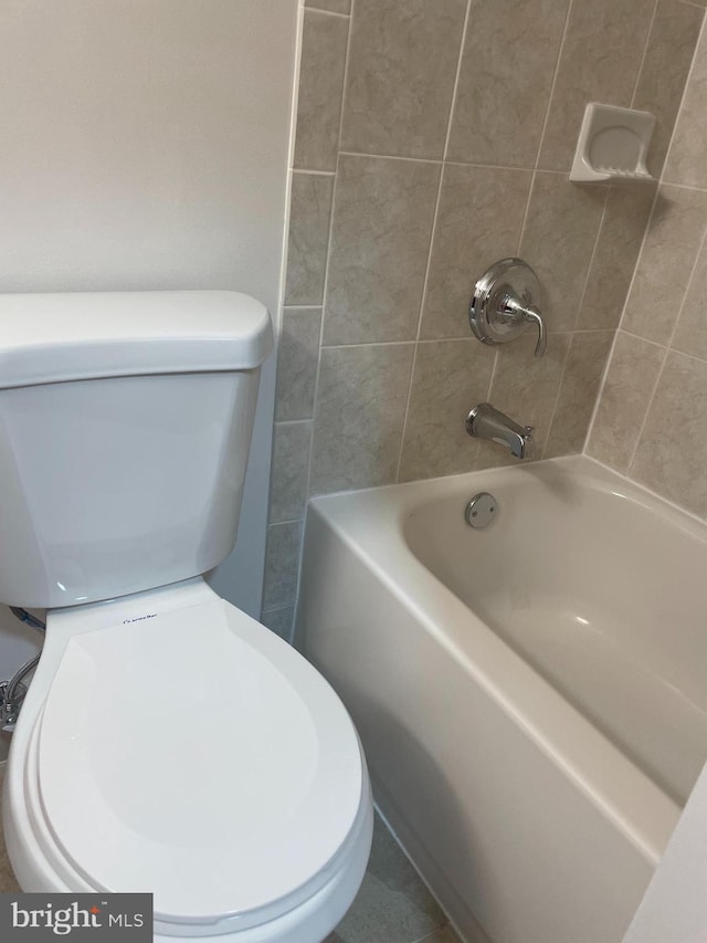full bath featuring toilet and shower / washtub combination
