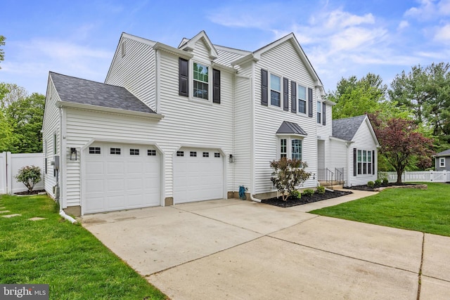 view of home's exterior with a yard, fence, an attached garage, concrete driveway, and roof with shingles