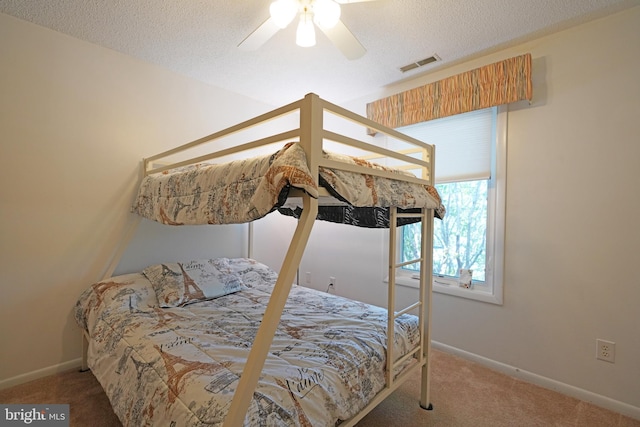 33955 Middleton Cir Unit 5, Lewes, DE 19958 - carpeted bedroom featuring baseboards, ceiling fan, and a textured ceiling
