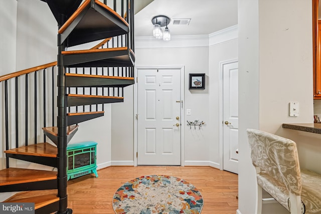 1507 Broadneck Pl Unit 403, Annapolis, MD 21409 - foyer entrance featuring wood-type flooring, crown molding, and baseboards