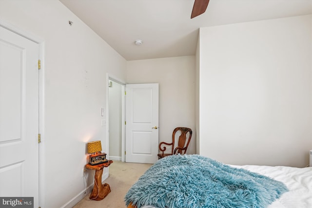 1507 Broadneck Pl Unit 403, Annapolis, MD 21409 - bedroom with light carpet, baseboards, and a ceiling fan