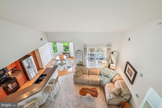1507 Broadneck Pl Unit 403, Annapolis, MD 21409 - living area with lofted ceiling and baseboards
