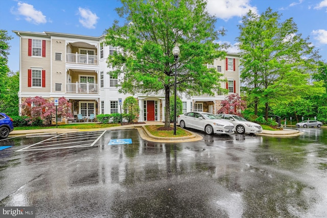 1507 Broadneck Pl Unit 403, Annapolis, MD 21409 - view of building exterior with uncovered parking