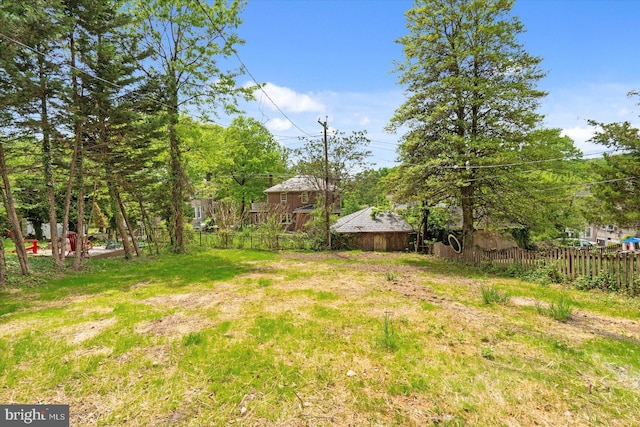 view of yard featuring fence