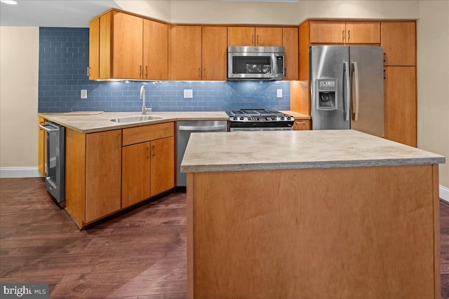 30 Morton Ct, Lawrence Township, NJ 08648 - kitchen featuring appliances with stainless steel finishes, a sink, dark wood-type flooring, and baseboards