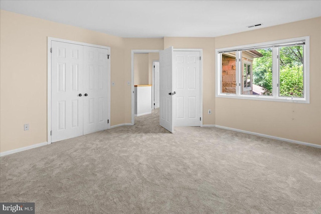 30 Morton Ct, Lawrence Township, NJ 08648 - unfurnished bedroom featuring carpet floors, baseboards, and multiple closets