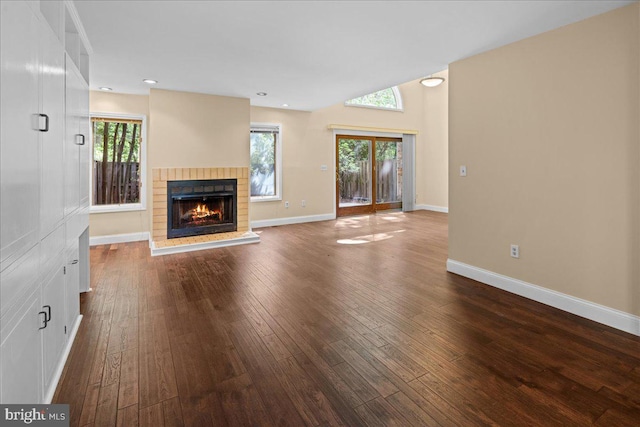 30 Morton Ct, Lawrence Township, NJ 08648 - unfurnished living room with a brick fireplace, dark wood-style floors, and baseboards