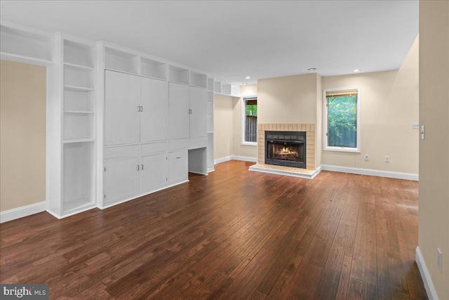 30 Morton Ct, Lawrence Township, NJ 08648 - unfurnished living room with dark wood-style flooring, baseboards, and a fireplace